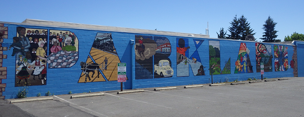 street art that reads Parkland with various city scenes depicted